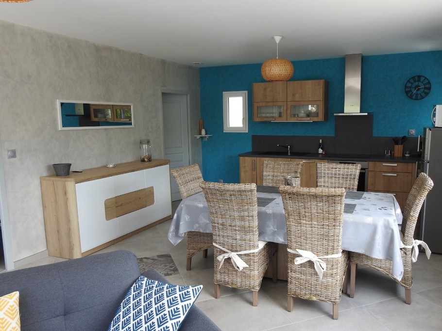 Salon - espace cuisine/salle à manger