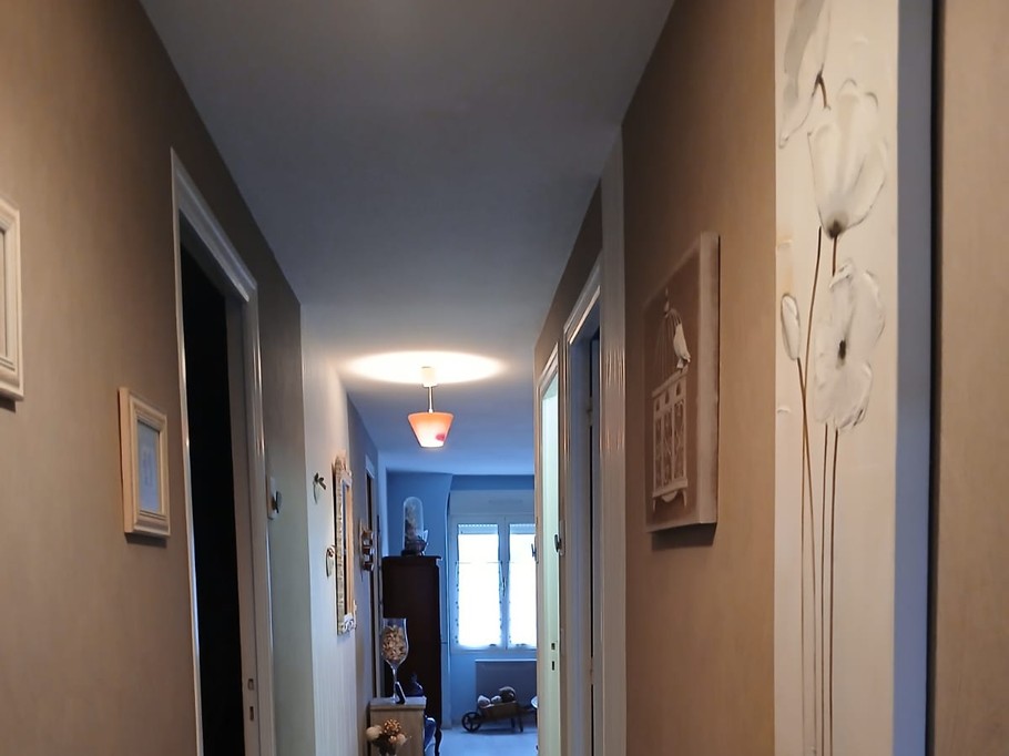 Corridor leading from the relaxation area to the bedrooms and bathrooms