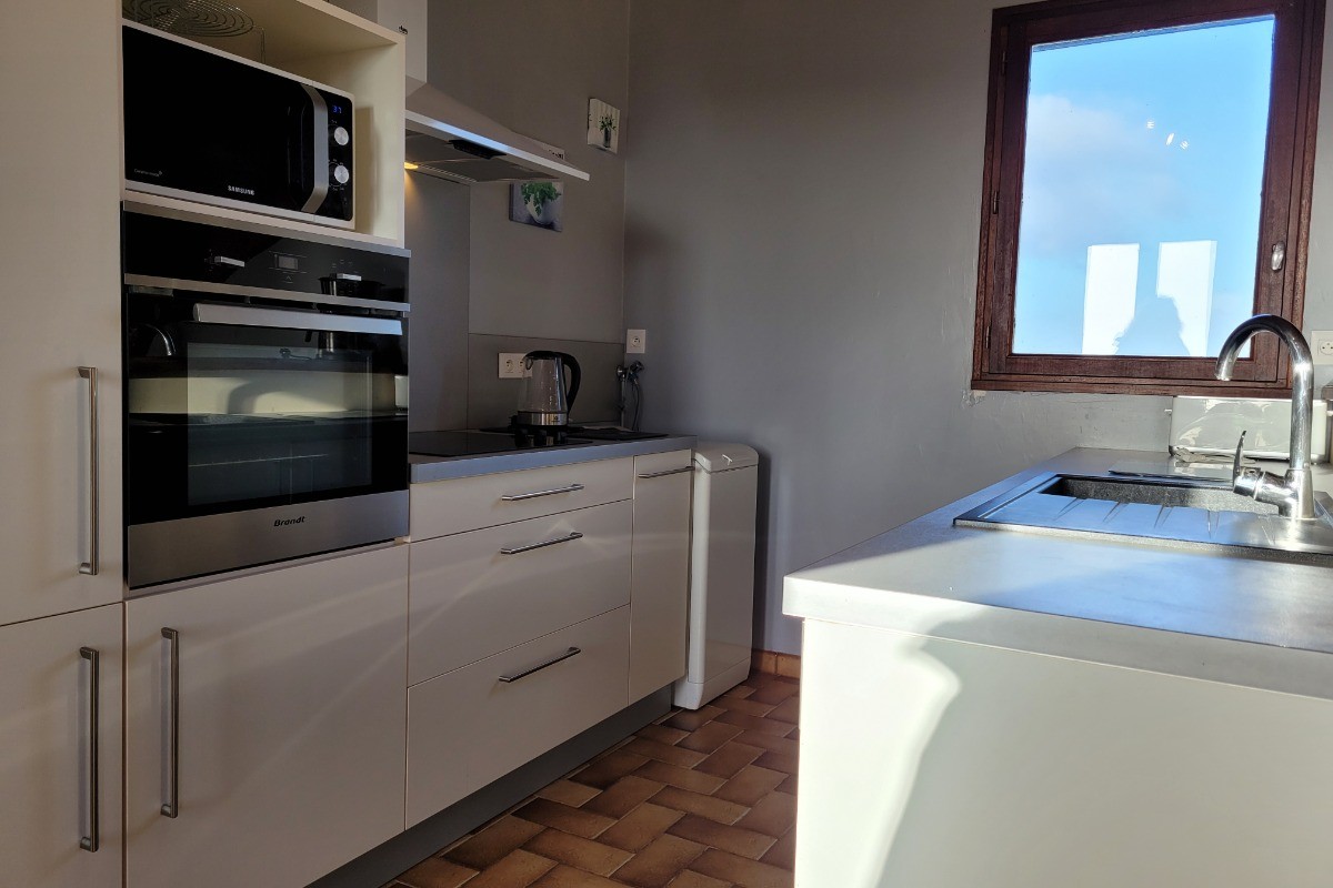 Le Coz, location, Pointe de la Tour, Plouha, Clévacances, pièce de vie au RDC avec salon salle à manger et cuisine
