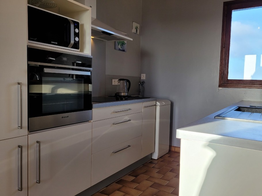 Le Coz, location, Pointe de la Tour, Plouha, Clévacances, pièce de vie au RDC avec salon salle à manger et cuisine