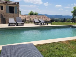 Piscine au sel chauffée avec volet immergé sous plage