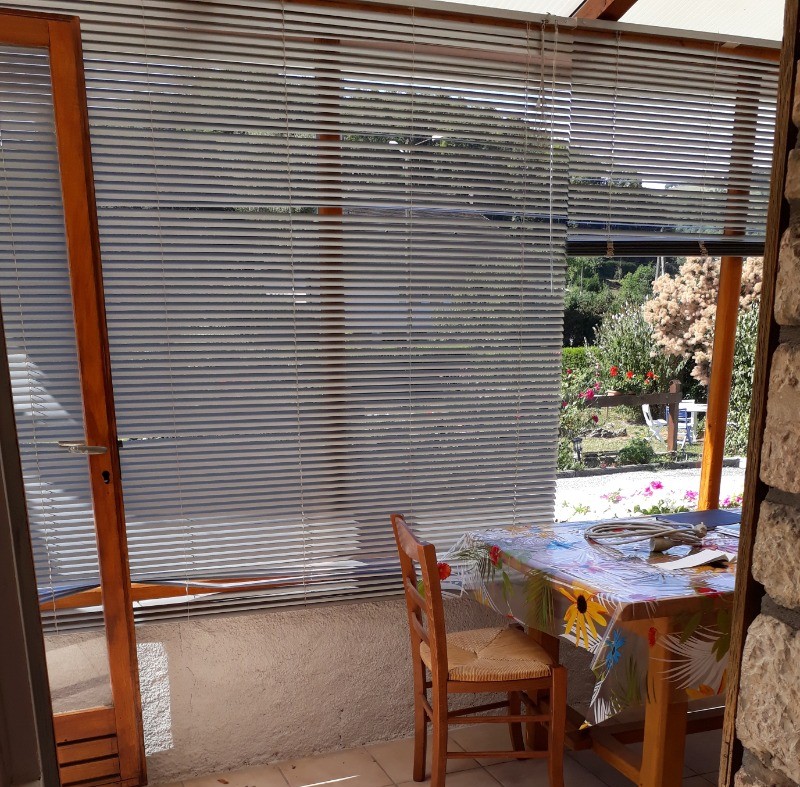 Accès à la véranda par la chambre