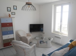 Salon avec canapé lit