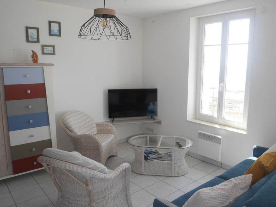 Salon avec canapé lit