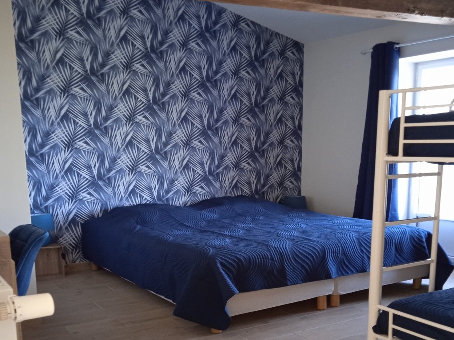 Chambre Turquoise 4 lits simples ou 2 lits simples superposés et un lit double