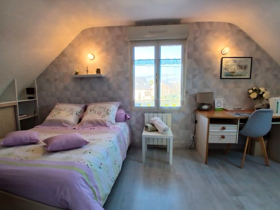 Bedroom 1 - 140 x 190 cm bed with desk, kettle and tea set, TV, wardrobe and chest of drawers.