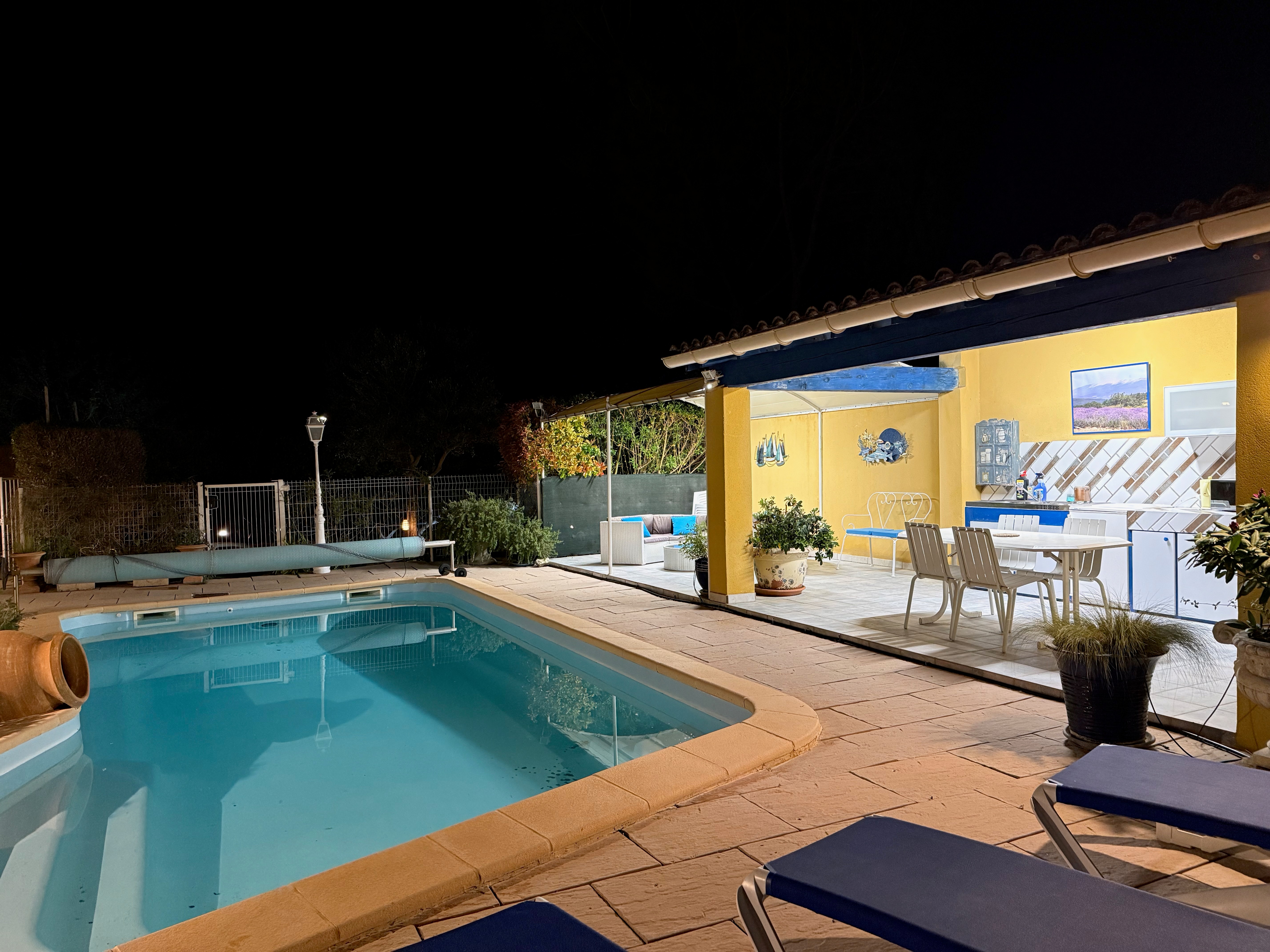 Pool house, swimming pool at night