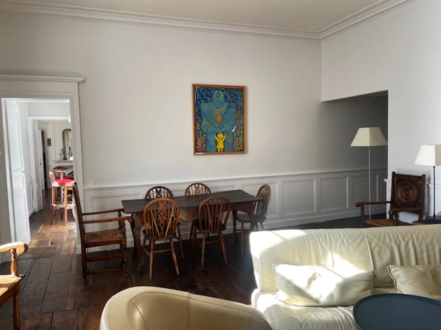 Living room with high ceilings and fireplace