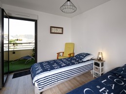 Separate beds room with access to balcony