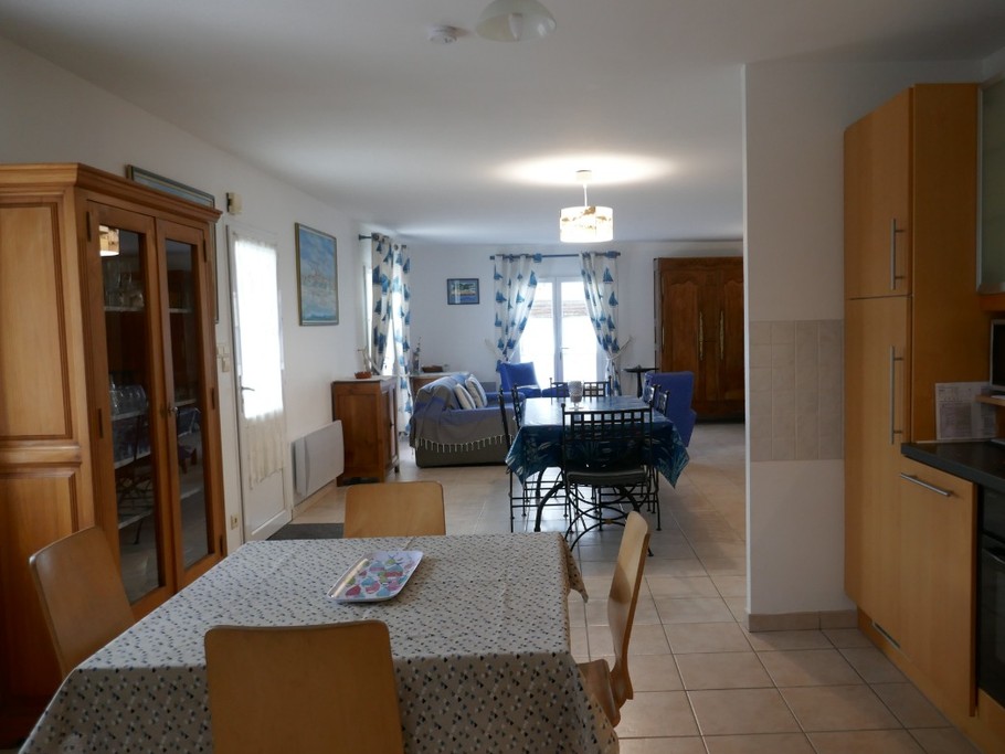 Kitchen opening onto living room