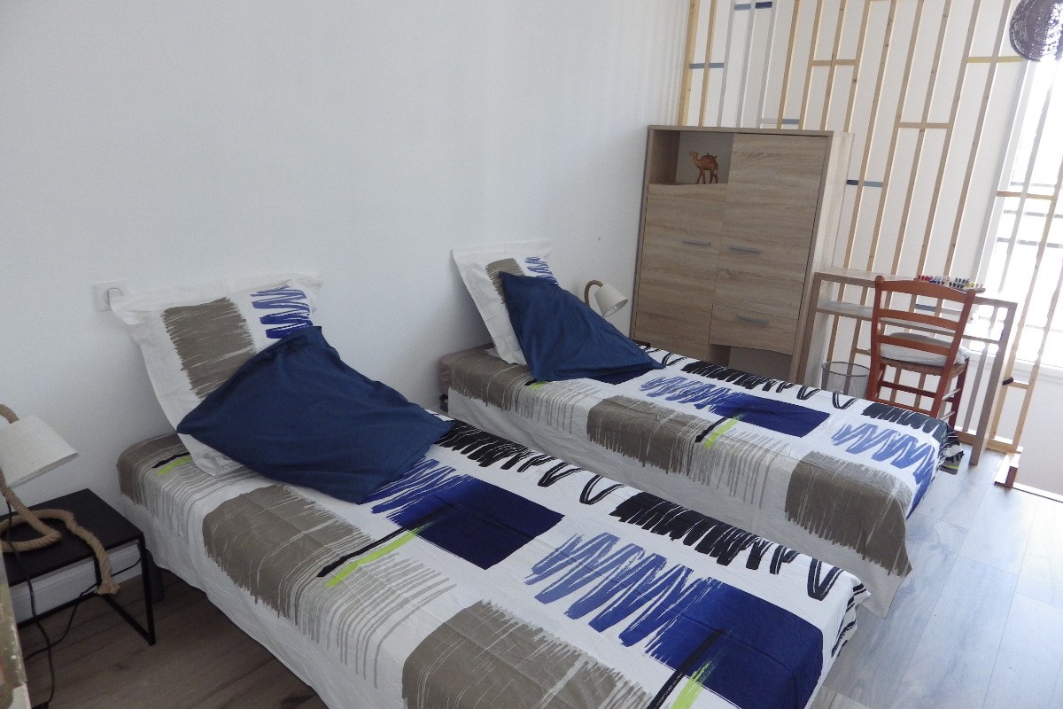 Chambre en lits individuels