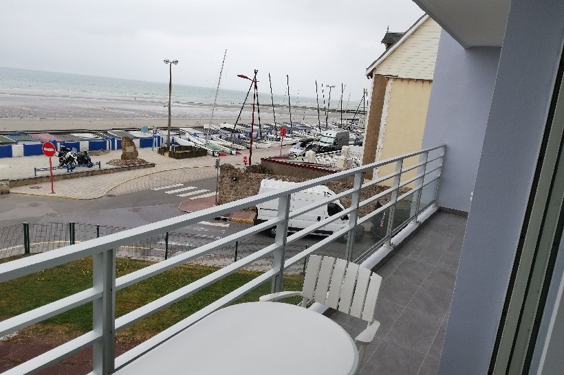 Immeuble terrasse face mer