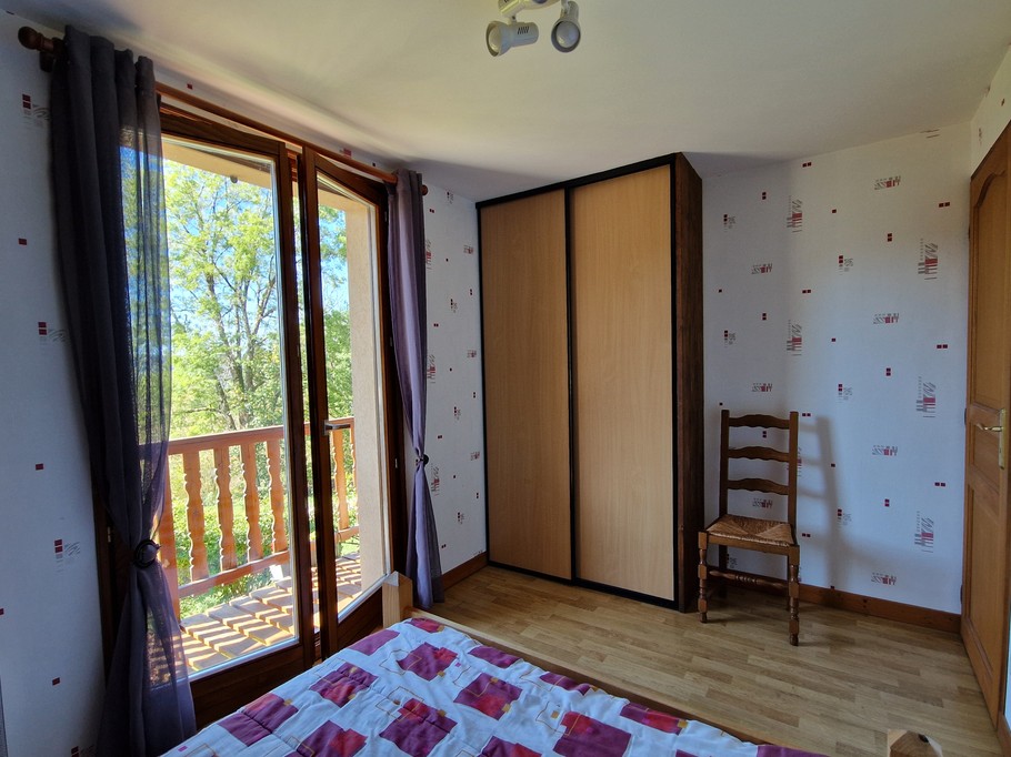 Bedroom 2 and its balcony - Arnica Holiday Cottage