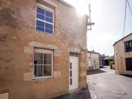 Situation de la maison dans la rue