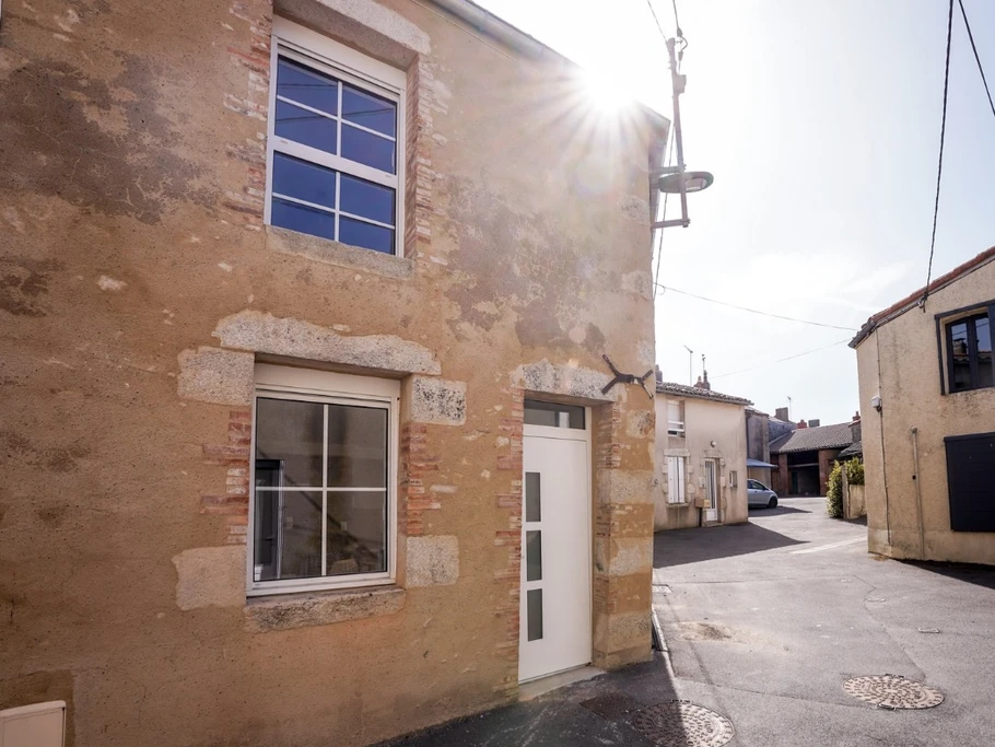Situation de la maison dans la rue
