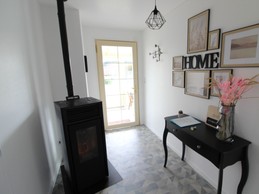 Entrée et son poêle à pellets - Le Chanot