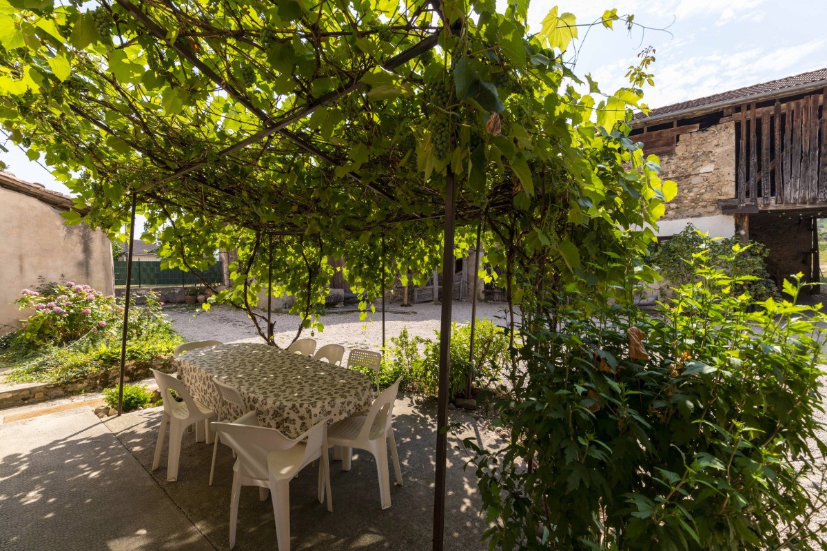 La pergola vous accueille dans la cour intérieure