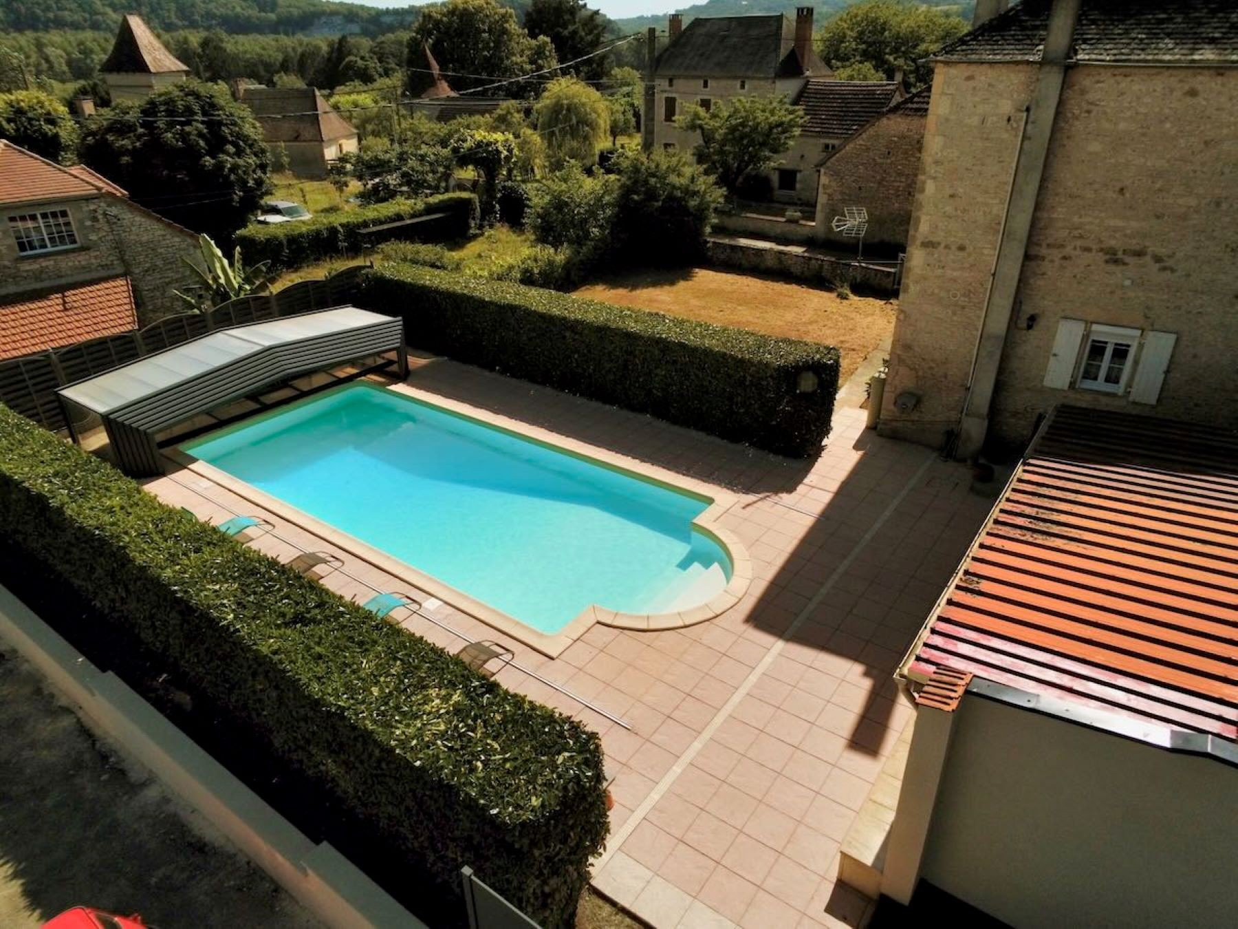 Piscine couverte et chauffée La Maison du Pont de la Roussie 24370 Pech de l'Espérance