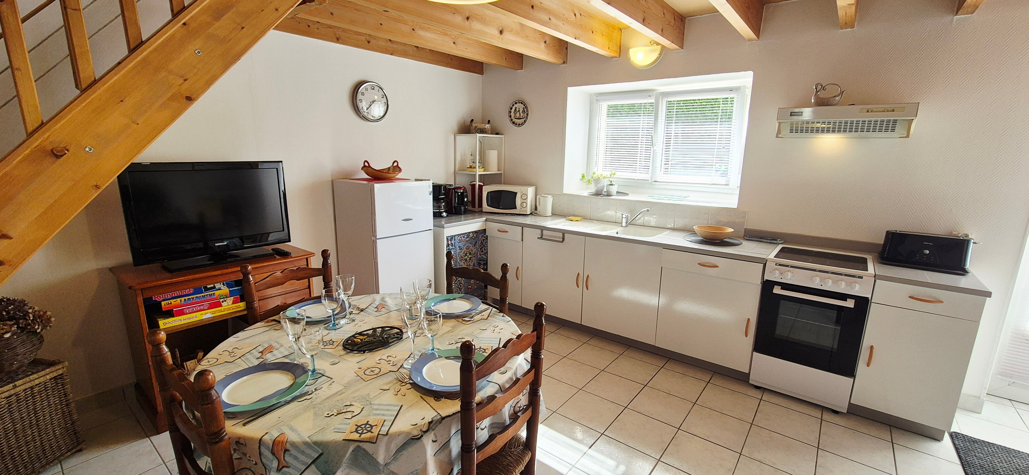 Salon-séjour avec cuisine équipée