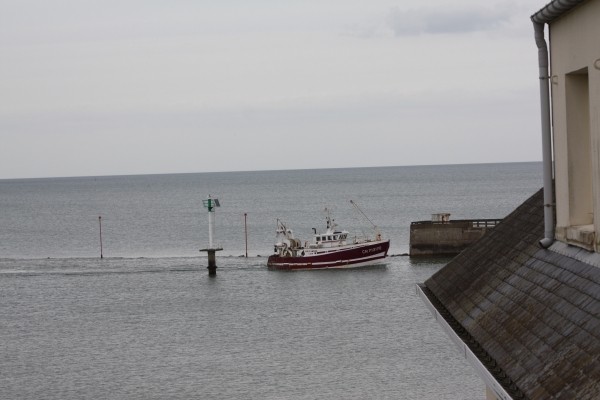 Vue de la chambre le retour des bateaux de pêche