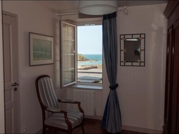 parents' bedroom with sea and fort views