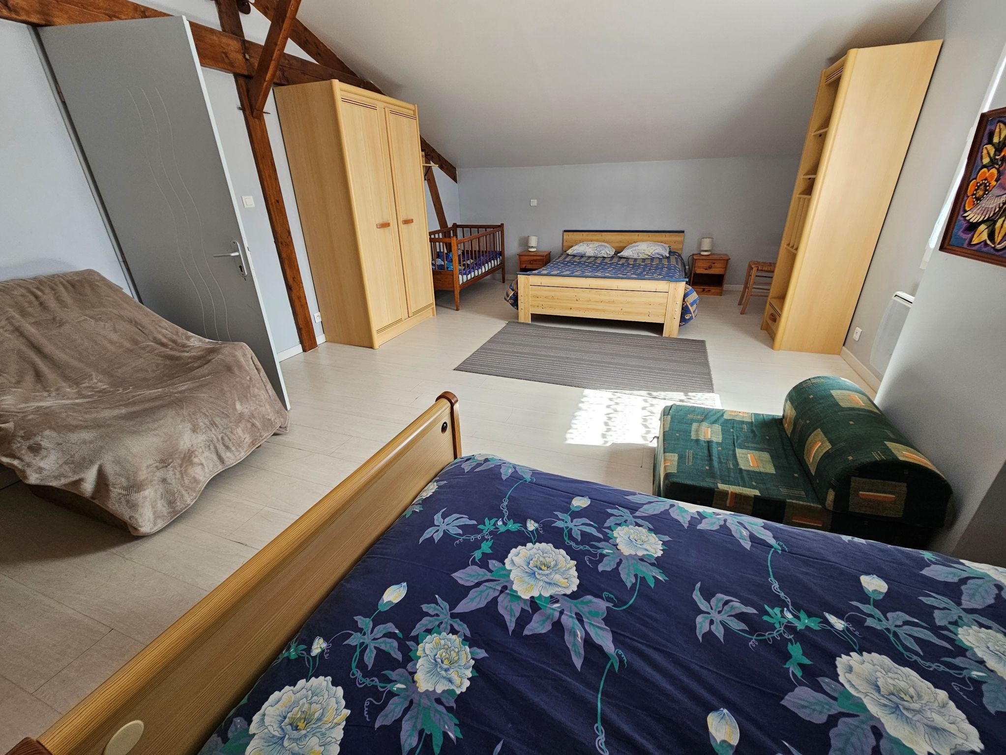 Une grande chambre de 25 m² pour 4
