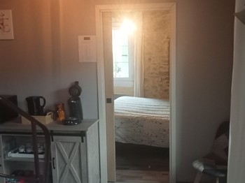 espace dinatoire et entrée chambre RDC