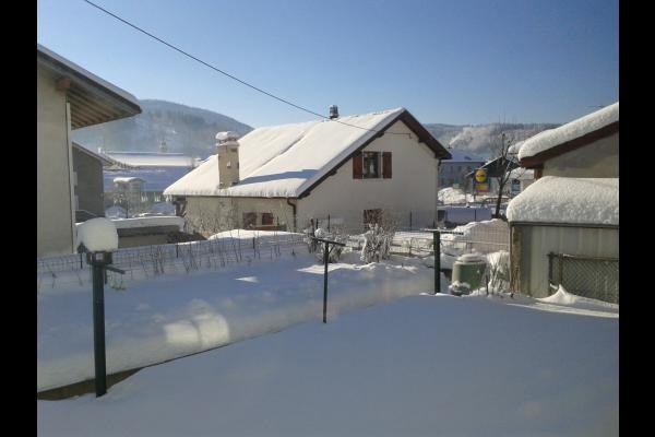 Hiver côté jardin - Séjour à Gérardmer - Appartement proche du centre ville, entre lac et nature