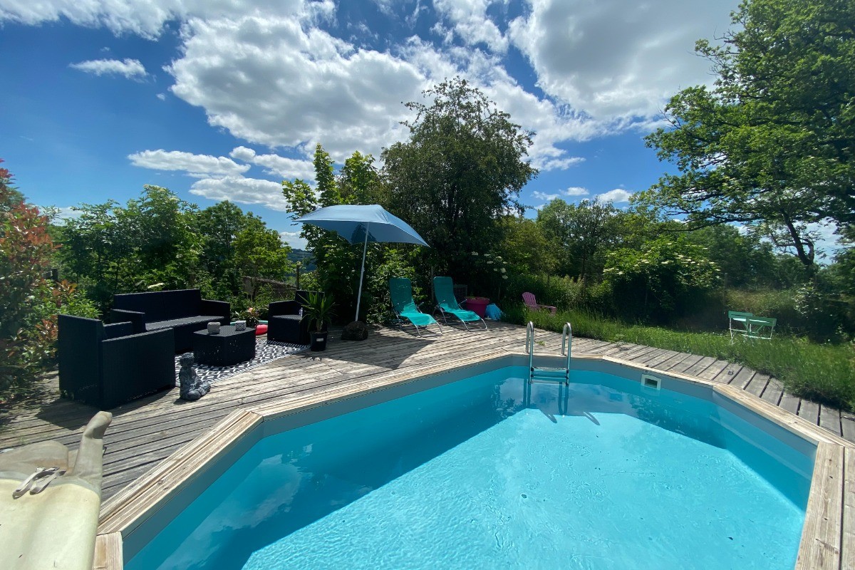 piscine chauffée avec salon