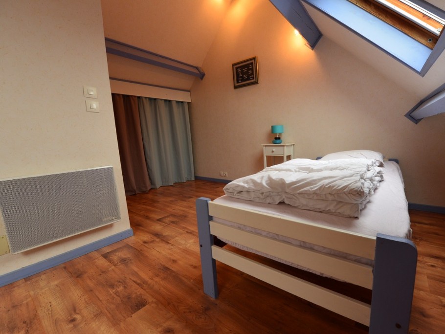La chambre avec 2 lits simples