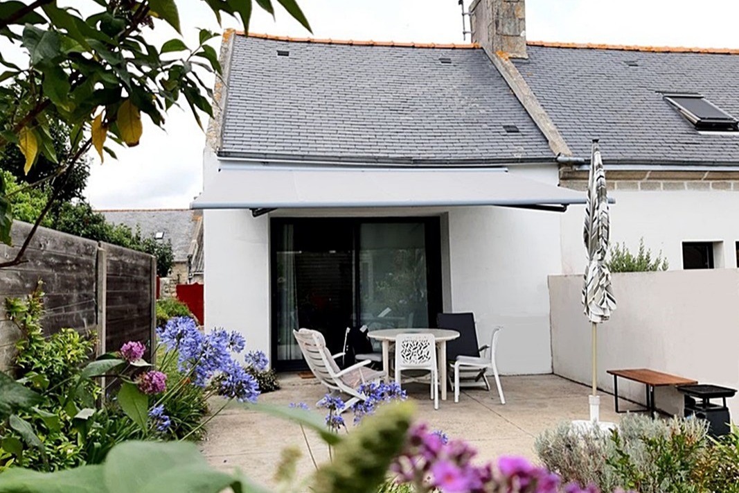 Maison avec store ban et terrass et jardin privatif clos