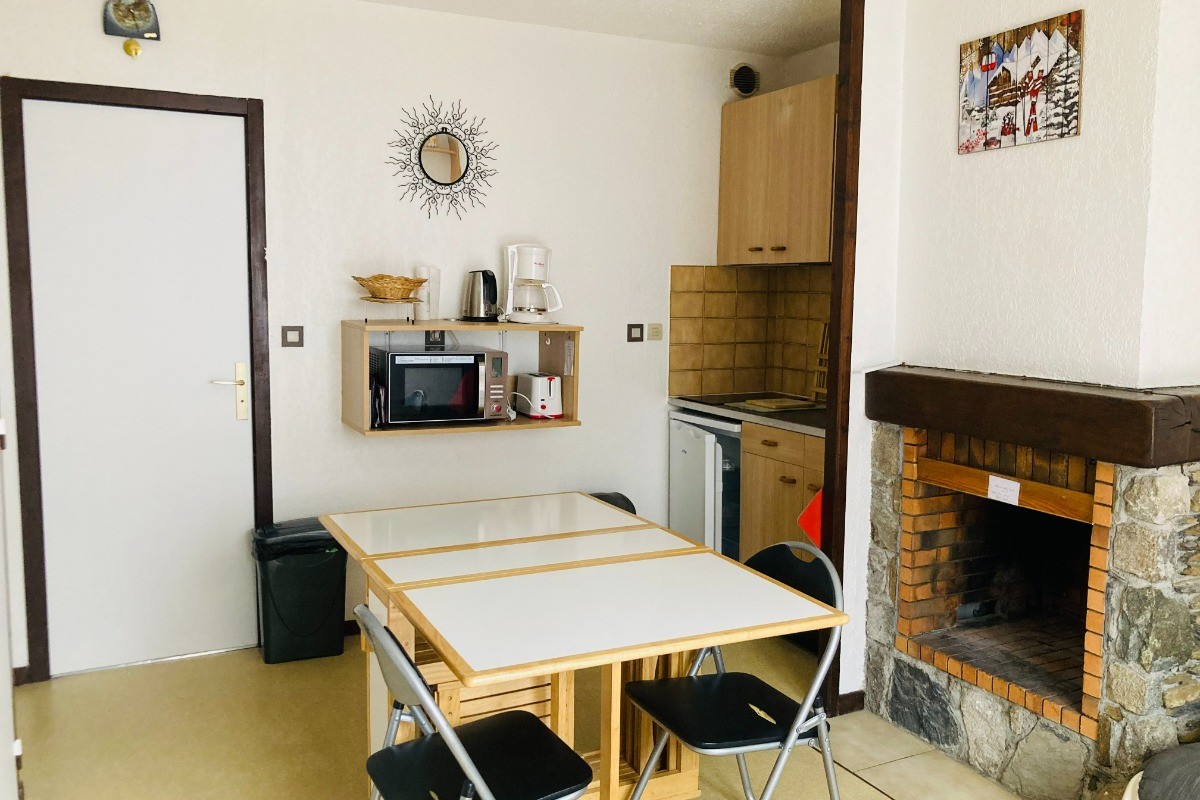 Espace cuisine/séjour - Table pliante