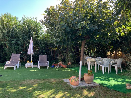 Enclosed garden with trees and landscaping that can be adapted as required.