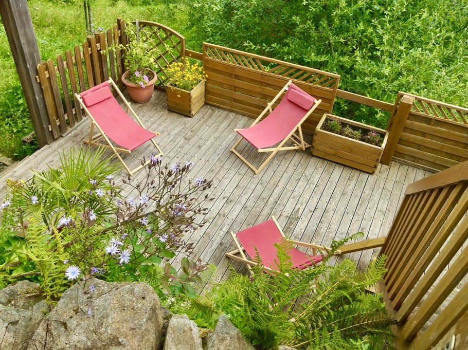 Terrace below, access from the chalet via the staircase on the right, visible in the photo / south-east facing