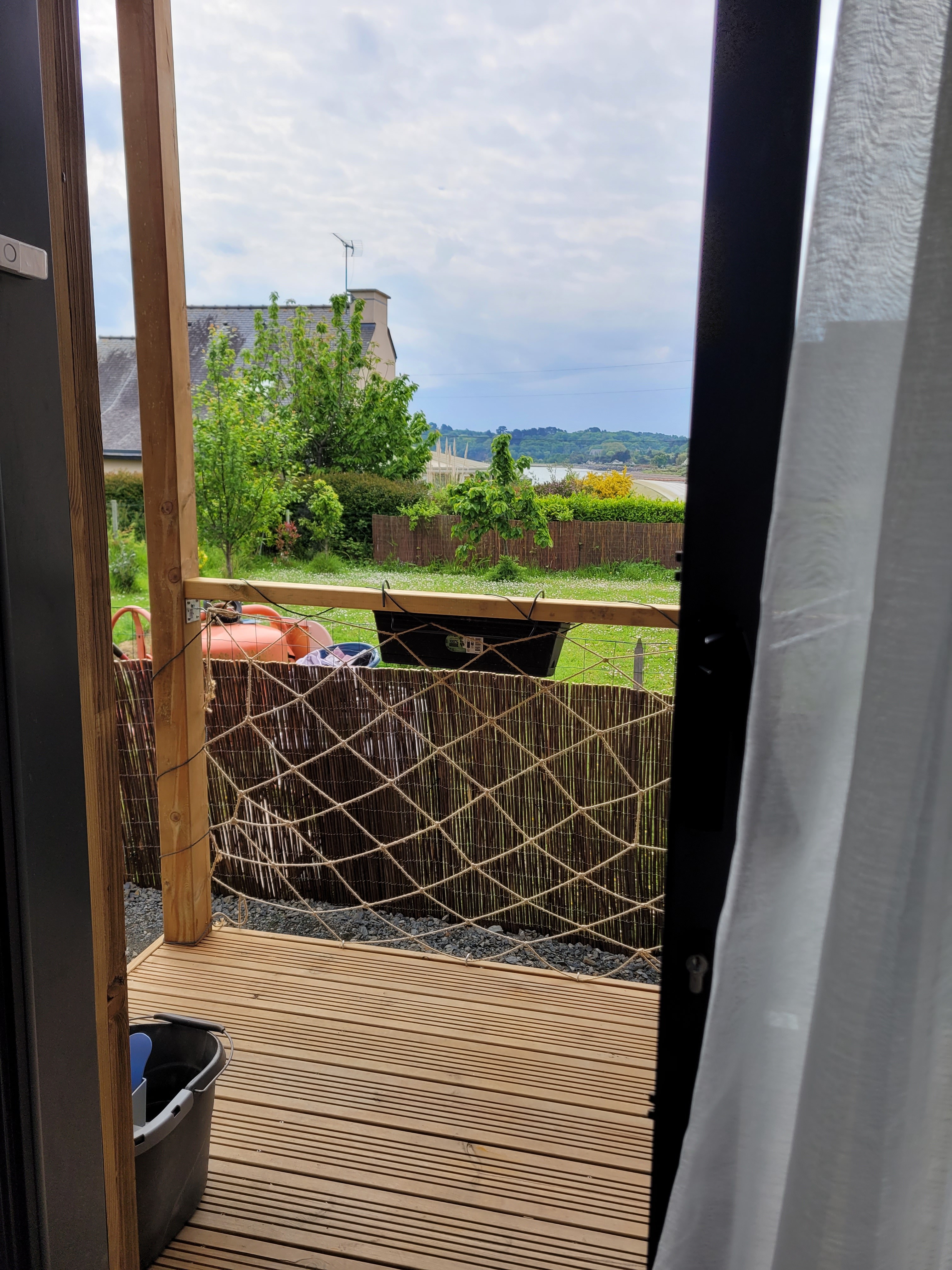 BARDES, Clévacances rental, Paimpol, view of the sea from the small wooden terrace