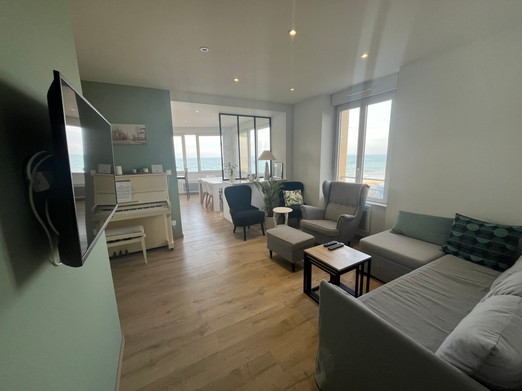 Location de vacances la villa des algues Grancamp maisy vue mer salon