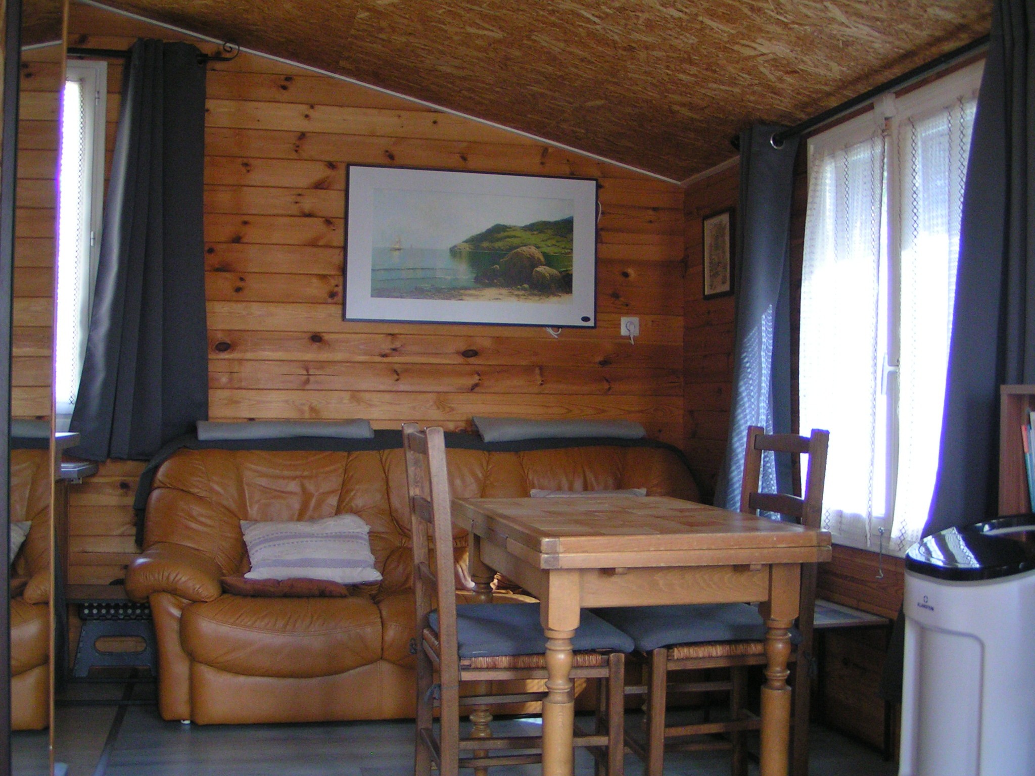 Living and dining area at Chalet Mimosa