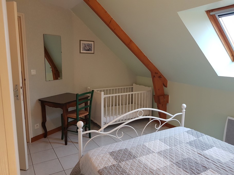 Room for 2 people with desk and cot
