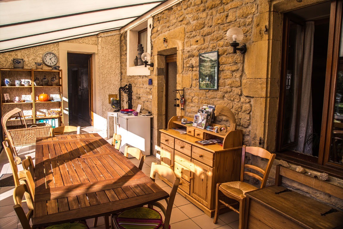 Véranda, coin détente, lecture - Chambre d'hôtes l'An XII