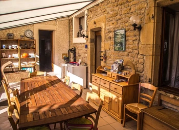 Véranda, coin détente, lecture - Chambre d'hôtes l'An XII
