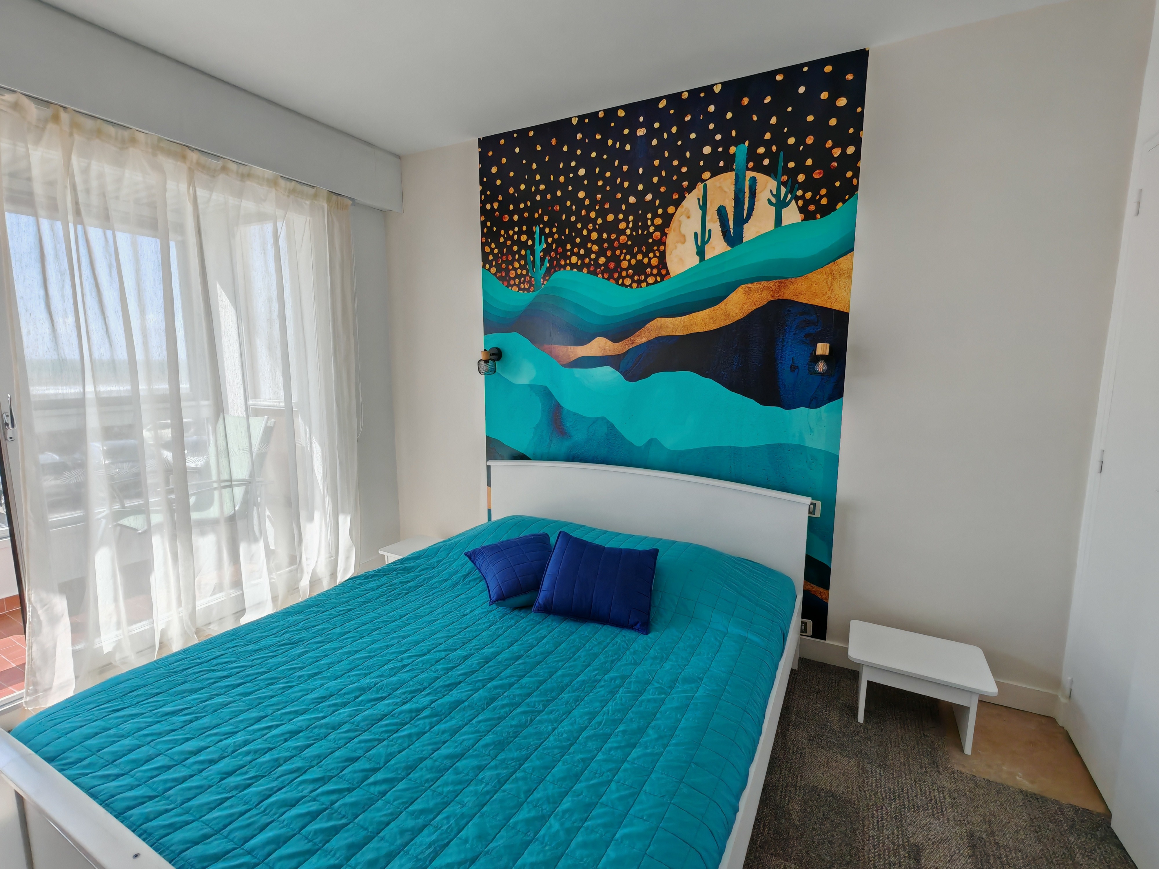 Bedroom 2 with access to the large loggia and ocean views