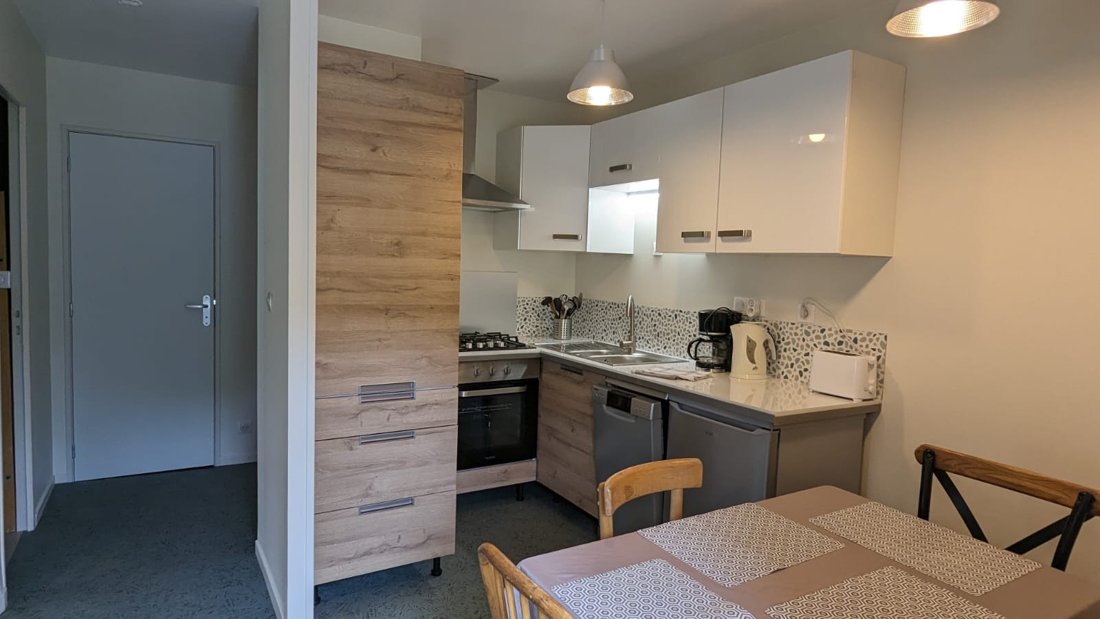 Fully-equipped kitchen in the 4-person gîte at Le Claux in the Cantal region of France