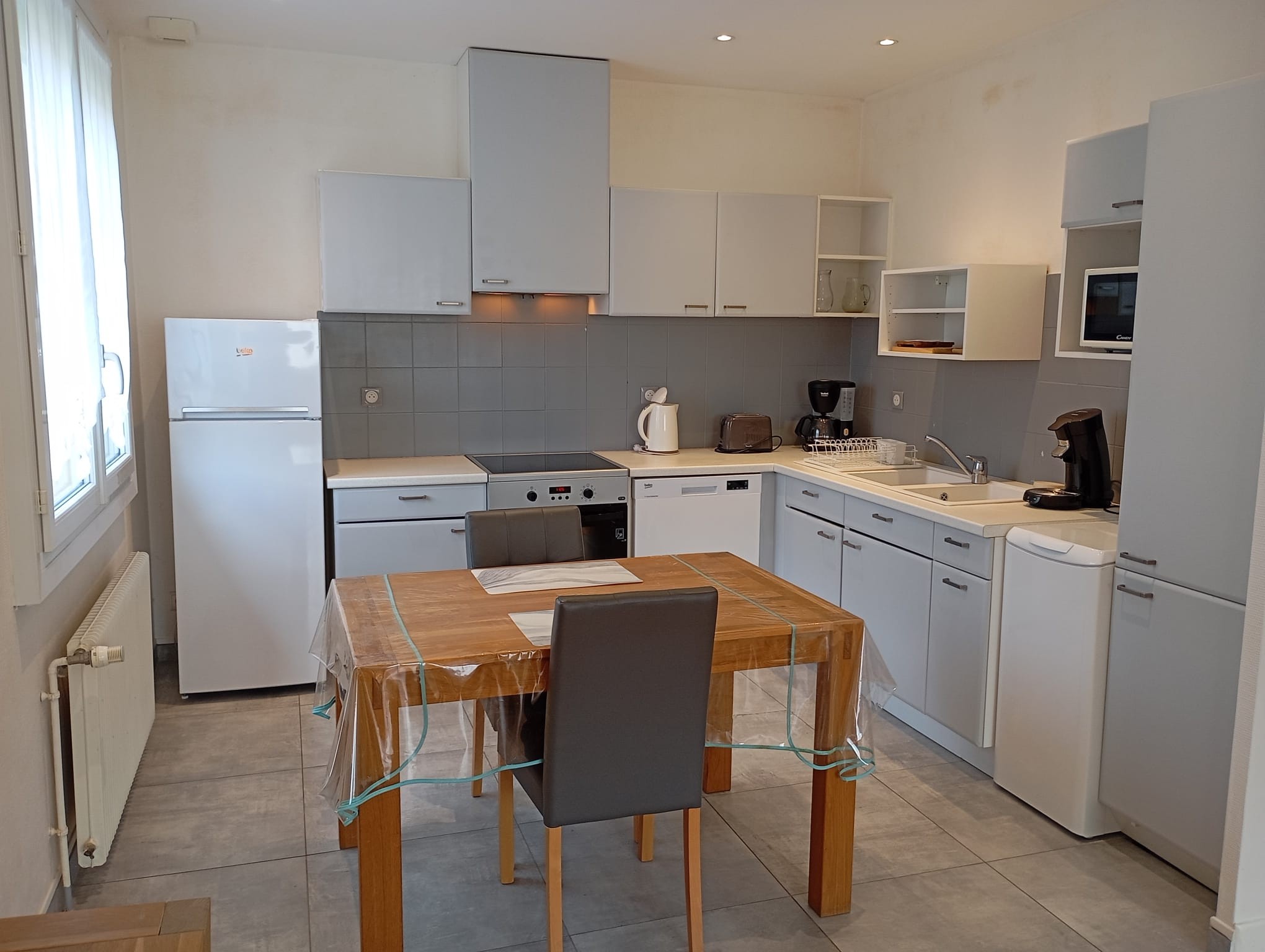 Dining area with integrated kitchen