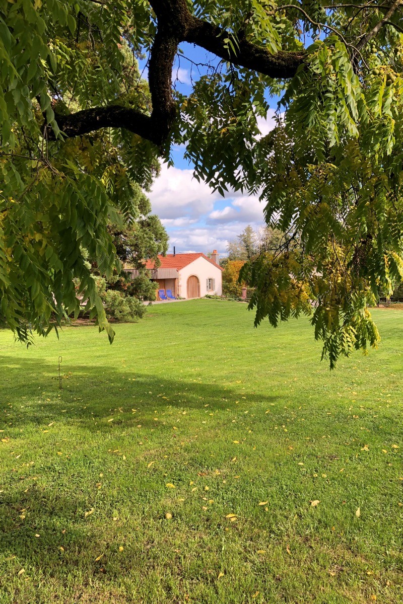 view of the gite under the black walnut tree