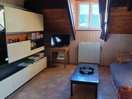 Coté salon avec canapé convertible pour 2 personnes