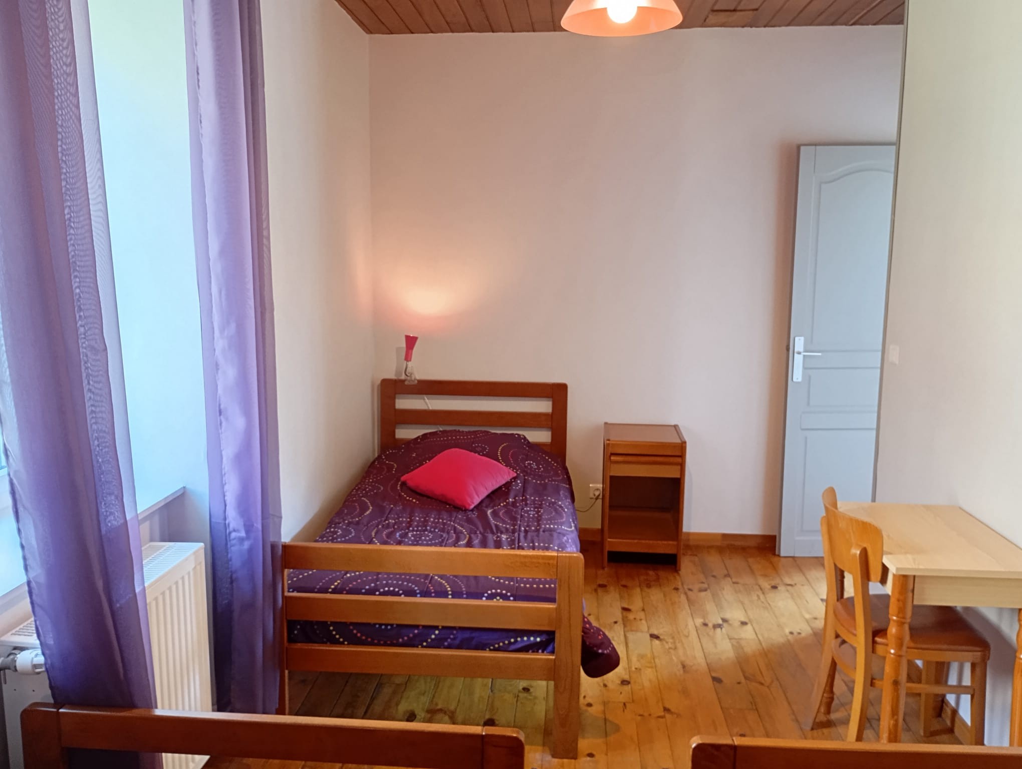 Bedroom 2 with 3 single beds (90cm) overlooking the mountain and park to the rear