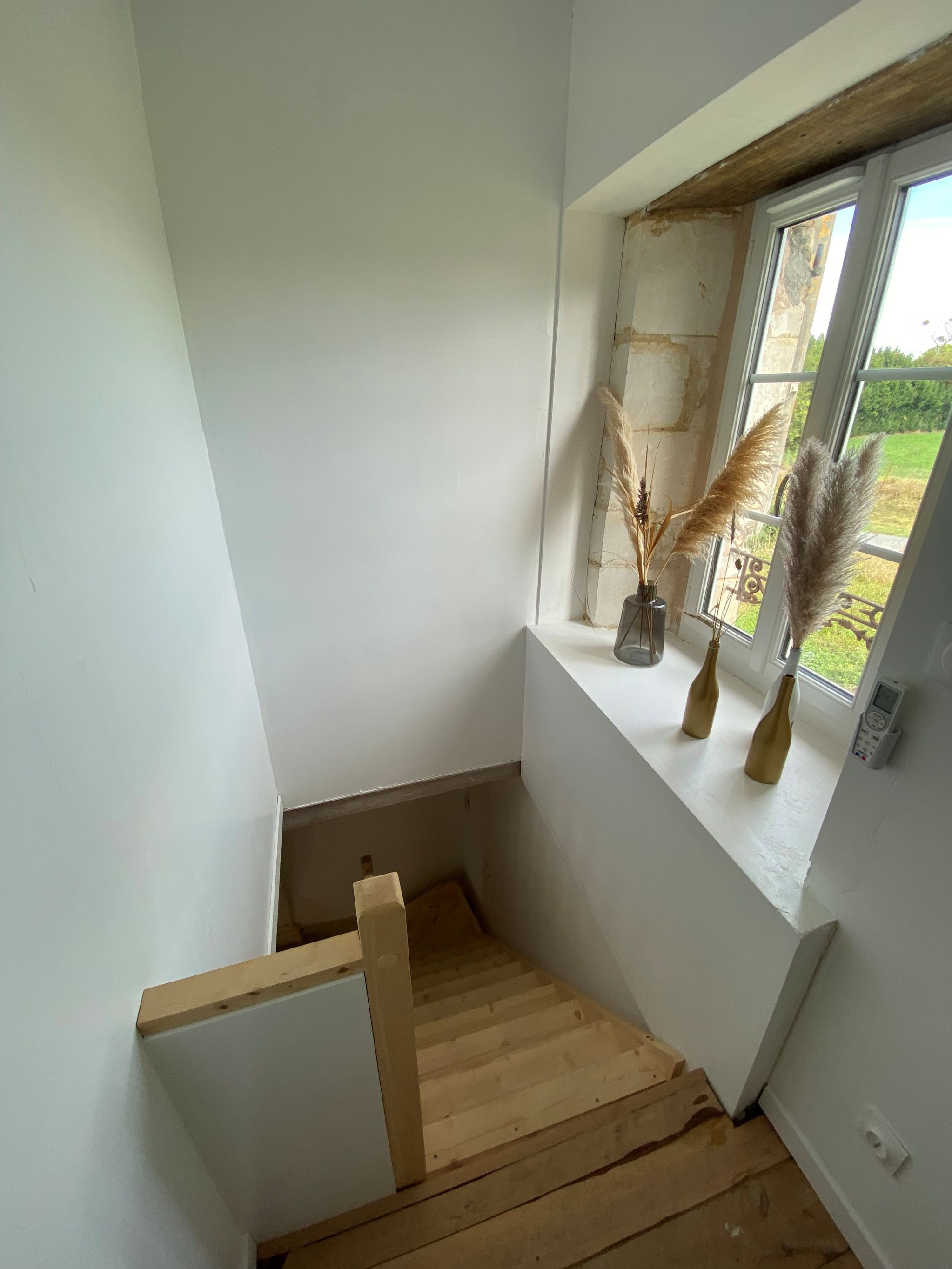 Escalier pour l'accès au 1er étage