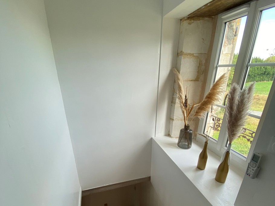 Escalier pour l'accès au 1er étage