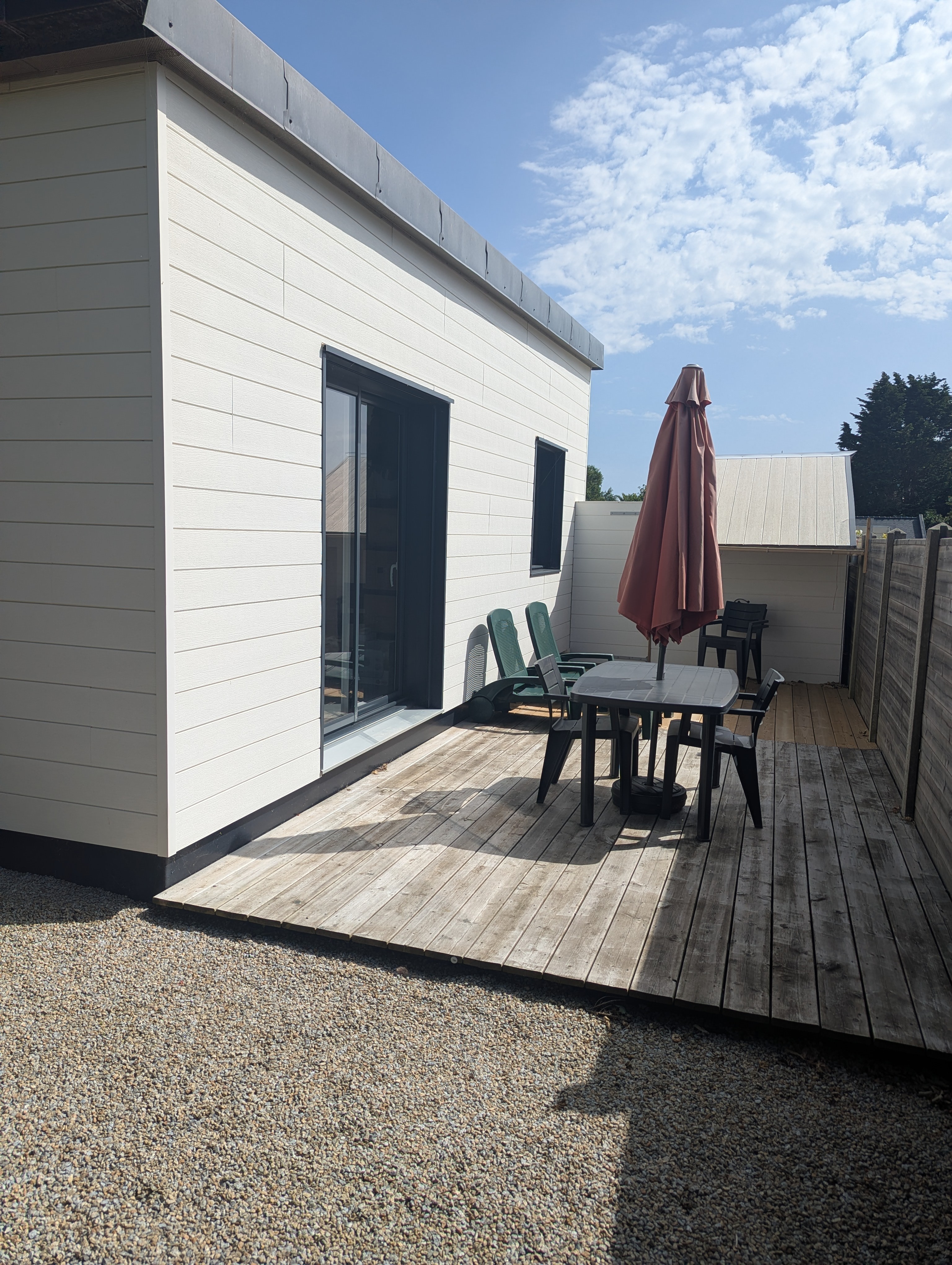 Relaxation area on the wooden terrace 