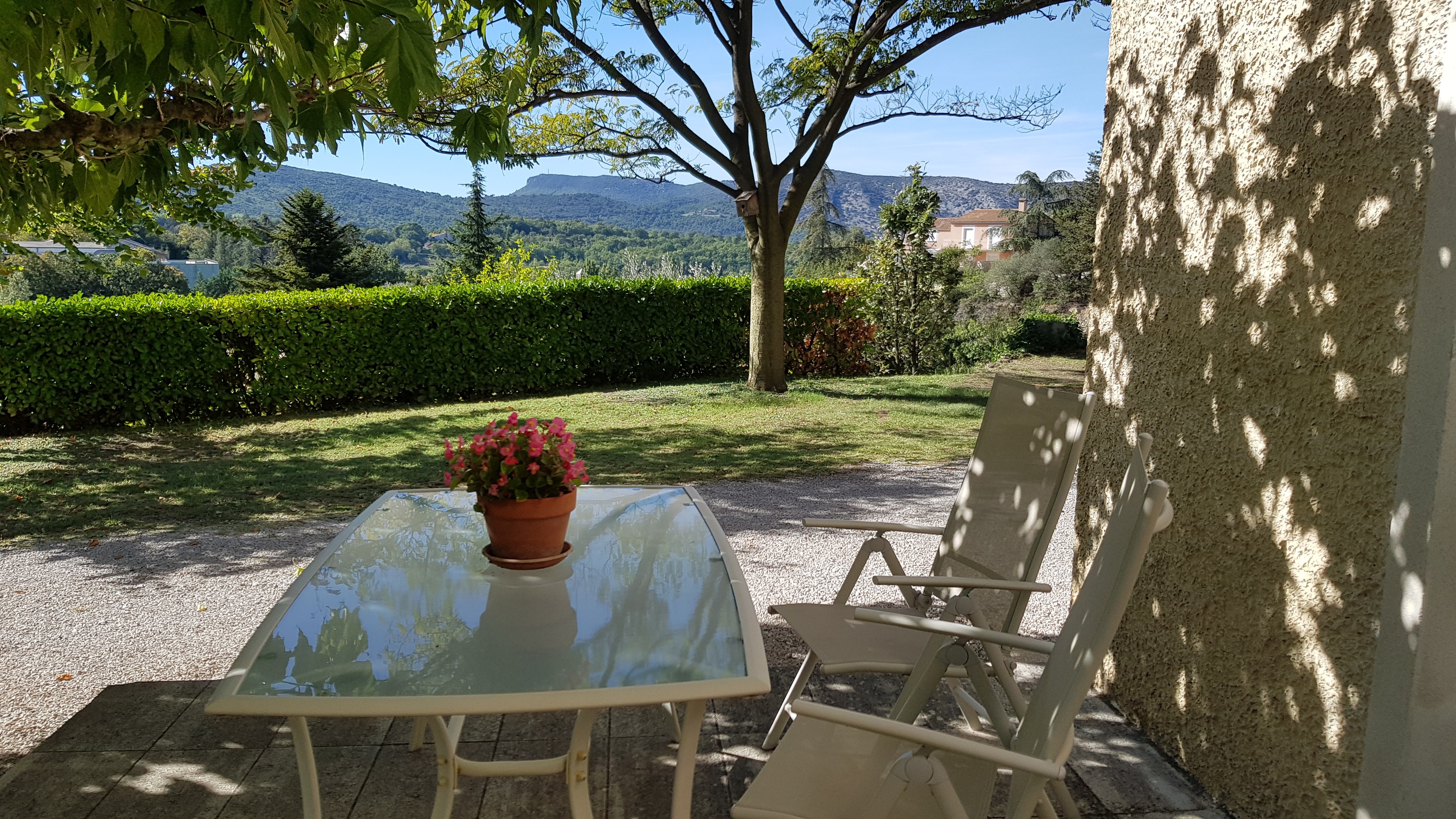 the shaded terrace with views